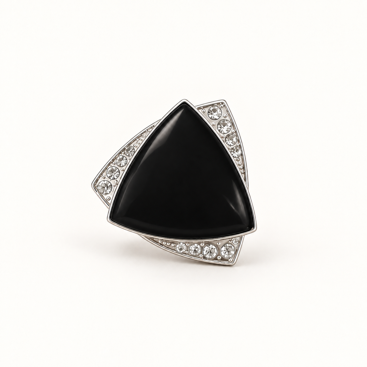 Black triangular scarf clasp with a silver-tone crystal-set frame, centered with generous off-white space